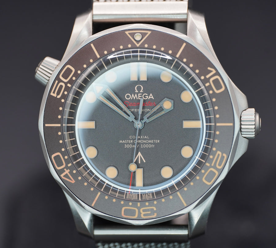 Omega Seamaster Diver 300M Omega Co-Axial Master Chronometer 007 Edition Brown Dial on Bracelet 210.90.42.20.01.001 Card 2021